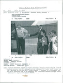 Michael Jackson with Lisa Marie Presley-Jackson accompanied by their bodyguard. - Vintage Photograph