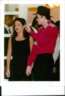 Michael Jackson with Lisa Marie Presley Jackson. - Vintage Photograph