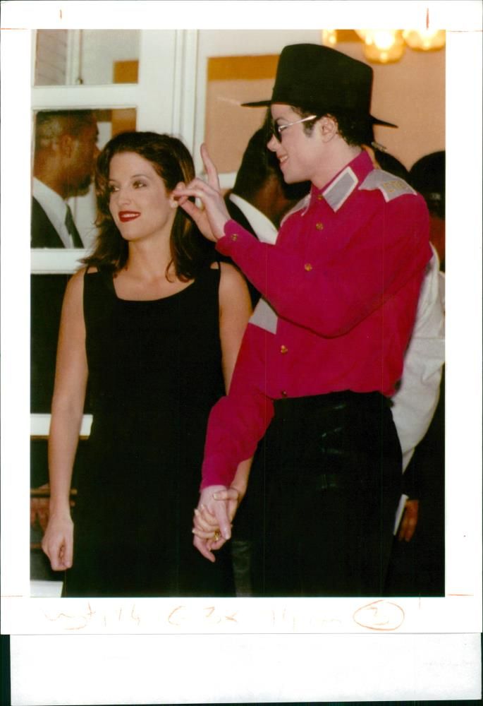 Michael Jackson with Lisa Marie Presley Jackson. - Vintage Photograph
