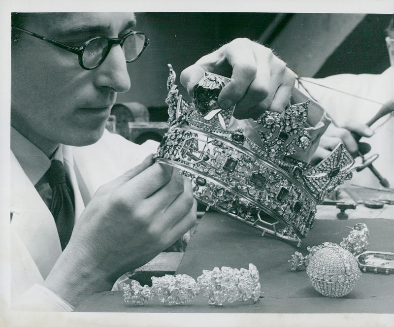 Queen Elizabeth II's Crown Procession 1953. Mr. H. G. Goodship controls the Black Prince's ruby ââon Queen Elizabeth's Crown. - Vintage Photograph