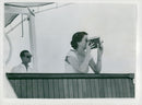 Queen Elizabeth with his movie camera aboard New Zealand cruiser Black Prince - Vintage Photograph