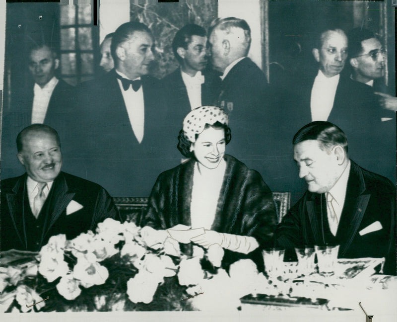 English State Visit in Paris. Queen Elizabeth in conversation with President Coty at the visit of the Galerie des Glaces - Vintage Photograph