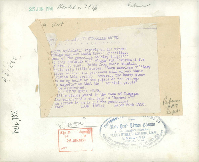 soldier stands guard in the town of yangsan. - Vintage Photograph