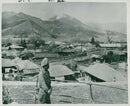 soldier stands guard in the town of yangsan. - Vintage Photograph
