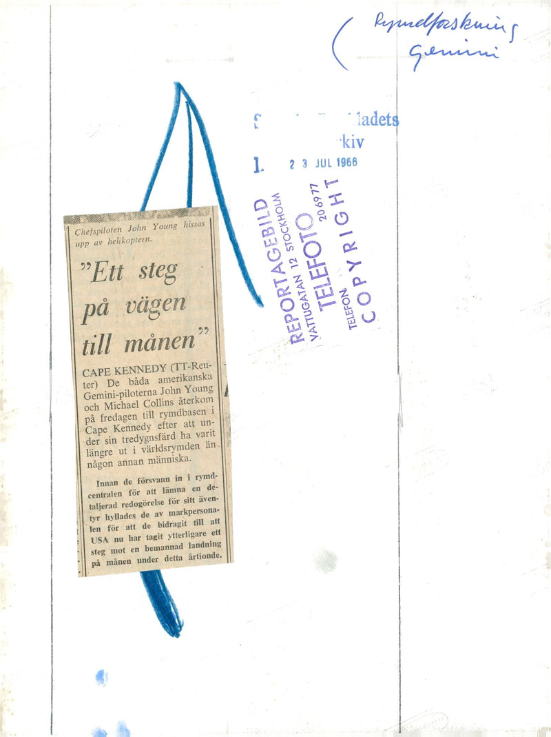 Gemini 10. Head of the game John Young is lifted up by the helicopter after landing - Vintage Photograph