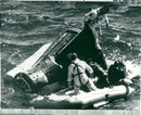 Charles Conrad has taken over to the rubber fleet from the canister after landing with Gemini 11 in the Atlantic - Vintage Photograph