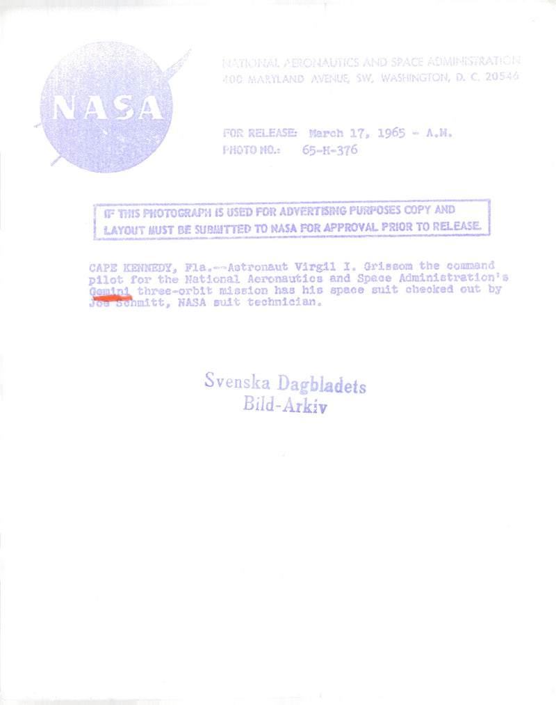 Astronaut Virgil I. Grissom gets his space suits controlled by a NASA technician - Vintage Photograph