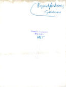 A space engineer demonstrates how astronaut Edward H. White II will use an "aerospace gun" with oxygen - Vintage Photograph