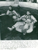 Astronauts James McDevitt and Edward White during a water practice - Vintage Photograph