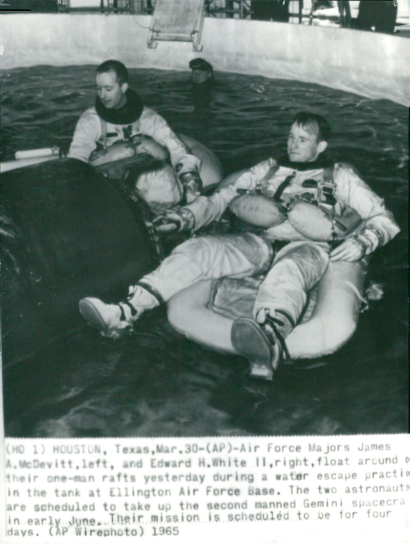 Astronauts James McDevitt and Edward White during a water practice - Vintage Photograph