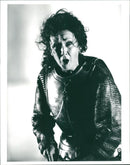 A woman presenting opera musical. - Vintage Photograph