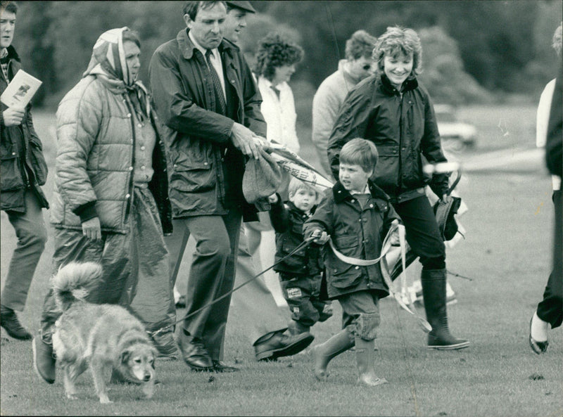 Prince William leads the way to attached to a canine. - Vintage Photograph