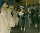 Queen Elizabeth The Queen Motherc visits fadshion display. - Vintage Photograph