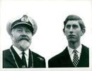 Prince Charles of Wales together with Captain Bill Warwick aboard Queen Elizabeth II. - Vintage Photograph