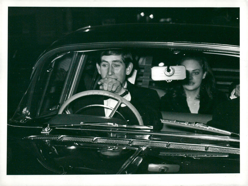 Prince Charles of Wales leaves the Comedy Theater with friends. - Vintage Photograph