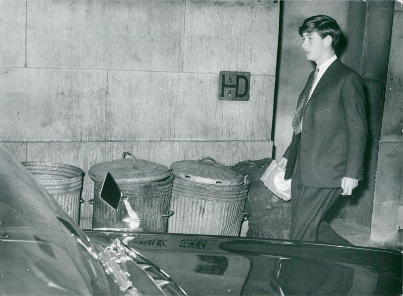 Prince Charles of Wales arrives at the Whitehall Theater. - Vintage Photograph