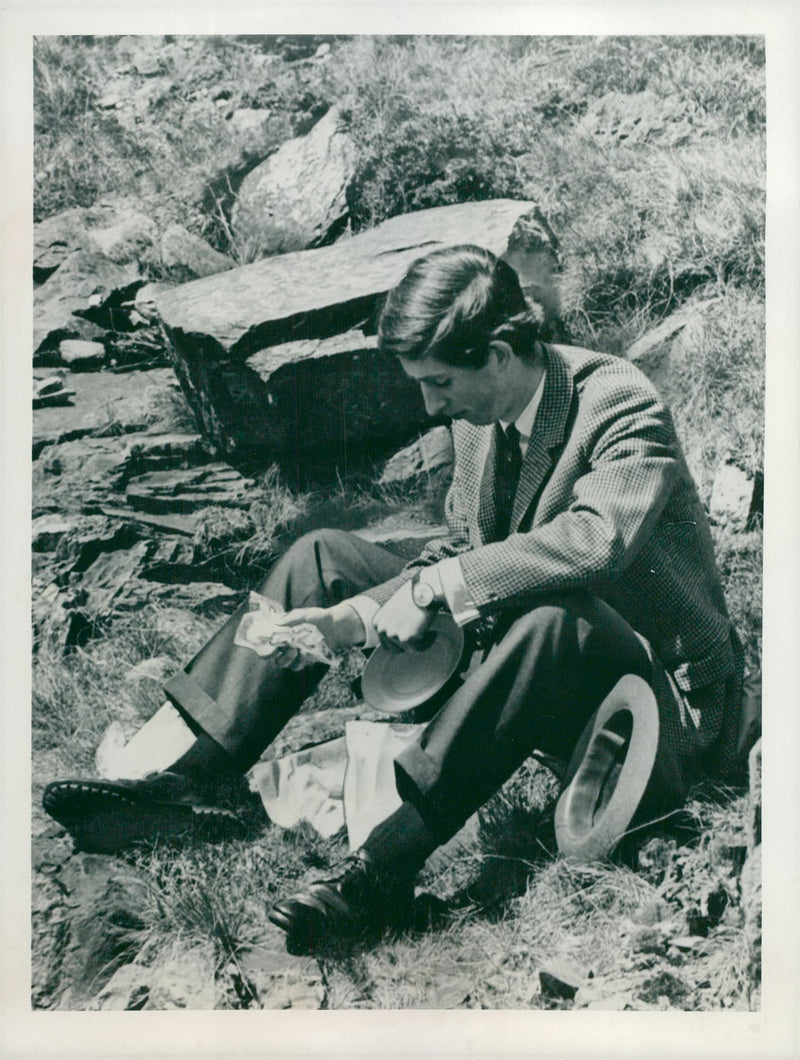 Prince Charles of Wales walks after a picnic at Lake Llyn Llydaw. - Vintage Photograph