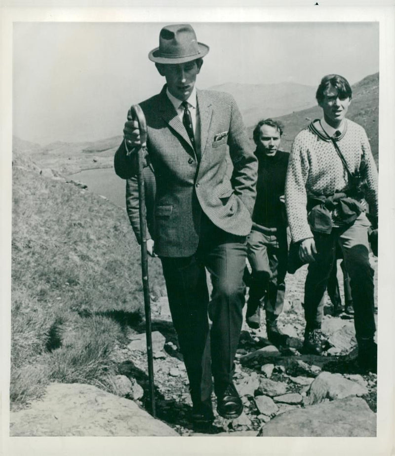 Prince Charles of Wales walks after a picnic at Lake Llyn Llydaw. - Vintage Photograph