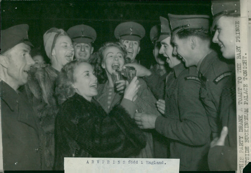 Prince Charles's birth is celebrated with a bowl outside Buckingham Palace - Vintage Photograph