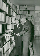 King Gustaf Adolf examines a book together with the Institute's writer file. IIc. Carl Gustaf Styrenius - Vintage Photograph