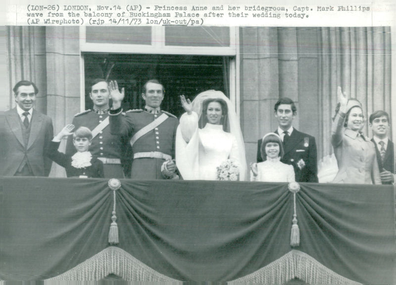 Princess Anne and Captain Mark Philips on the balcony of Buckingham Palace together with the other royal family. Prince Charles and Queen Elizabeth II, among others - Vintage Photograph