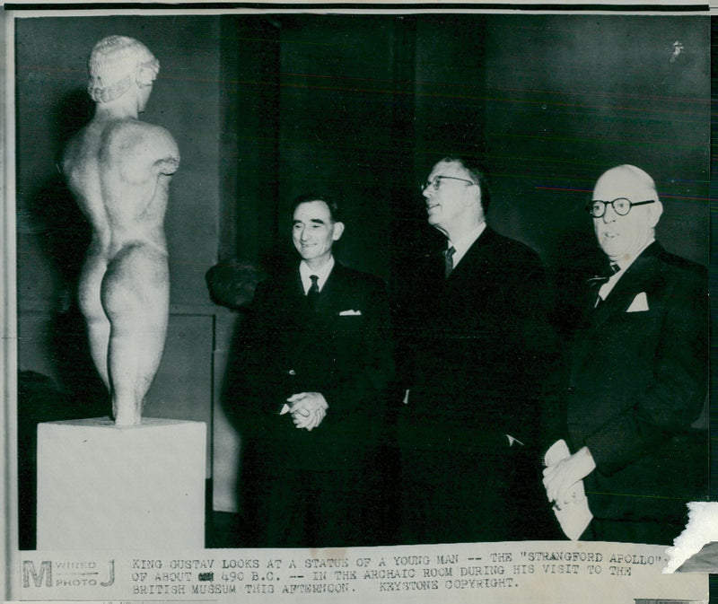 King Gustaf VI Adolf views the statue "Strangford Apollo" during a visit to the British Museum - Vintage Photograph