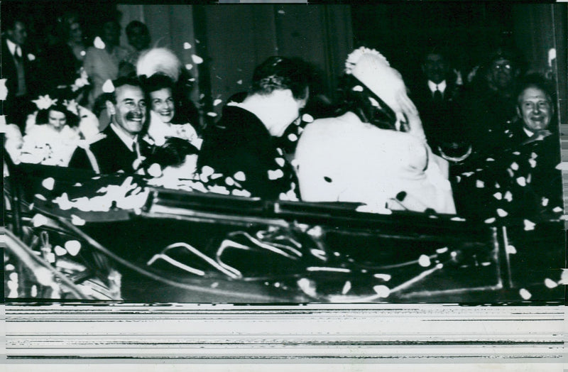 Queen Elizabeth II and Prince Philip receive the jubilation of the people after their wedding - Vintage Photograph