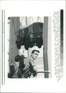 French Soldiers watch the unloading vahicle. - Vintage Photograph
