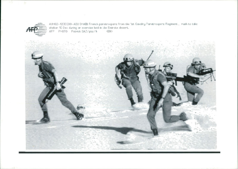 French Paratroopers rush to take shelters. - Vintage Photograph