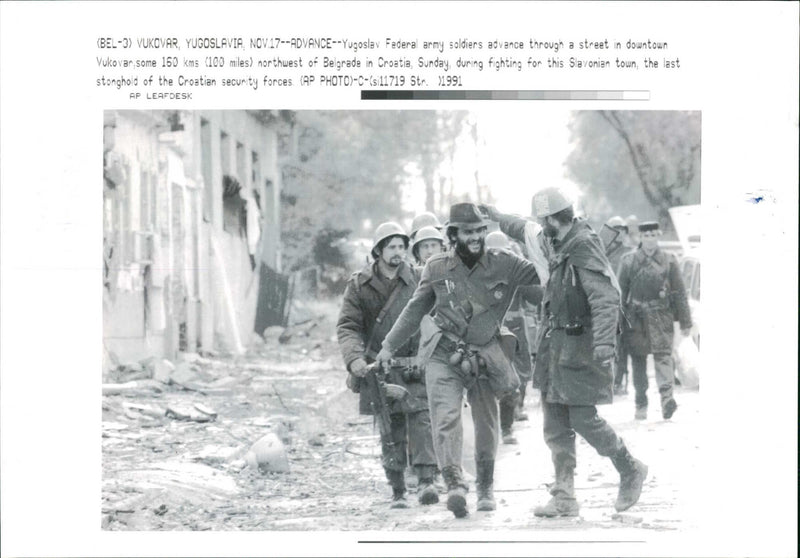 A Yugoslav unit enters Vukovar. - Vintage Photograph
