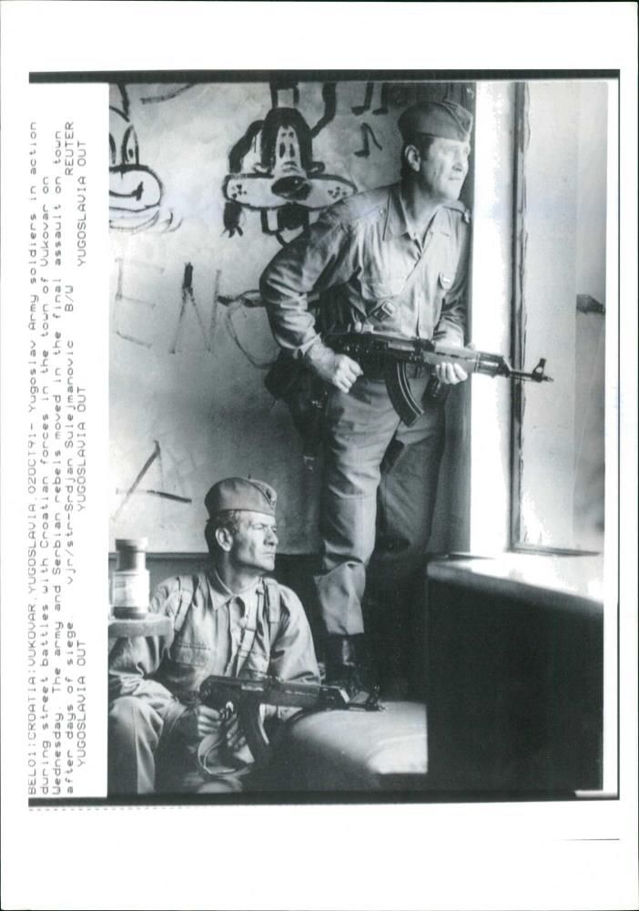 Yugoslav army soldiers in action. - Vintage Photograph