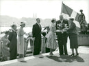 The city council president Carl Albert Andersson's wife, MÃ¤rta Andersson, handed a bouquet to Queen Elizabeth. - Vintage Photograph