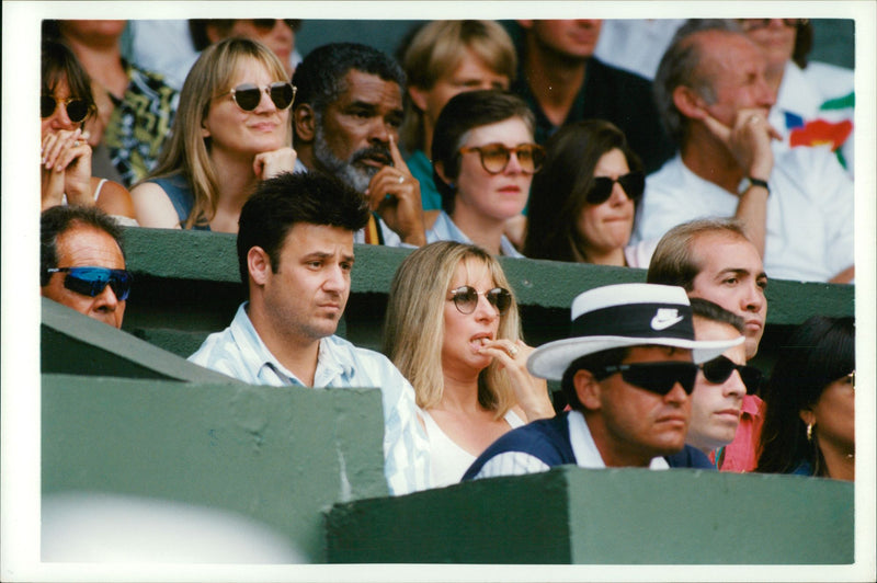 Actress Barbra Streisand watching Andre Agassi's match. - Vintage Photograph