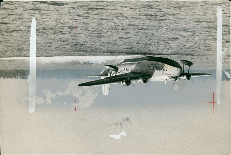 An Airplane on the sea surface. - Vintage Photograph