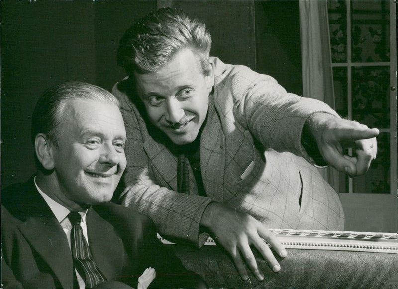 Per Aabel and Per SjÃ¶strand discuss a detail in the set of the former 'Adventures' of the city theater - Vintage Photograph