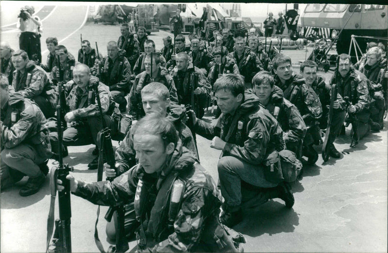 Men of the Royal Marines  waiting to board  a Sea King helicopter - Vintage Photograph