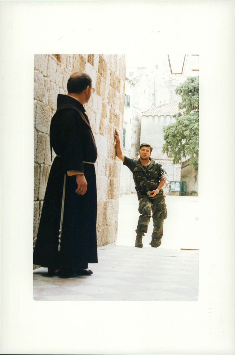 A soldier and a priest. - Vintage Photograph