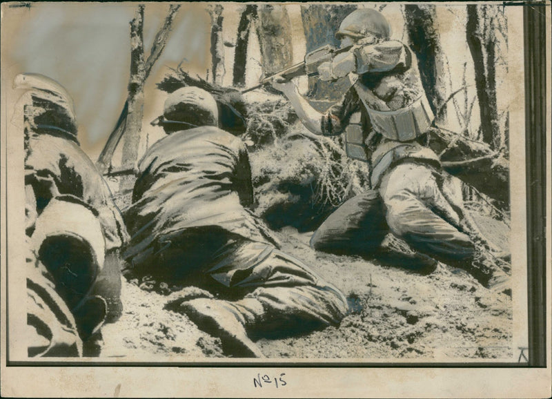 American soldiers firing into a communist bunker during Vietnam War - Vintage Photograph