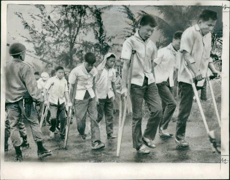 North Vietnamese prisoners of war approaching the Ben Hai bridge - Vintage Photograph