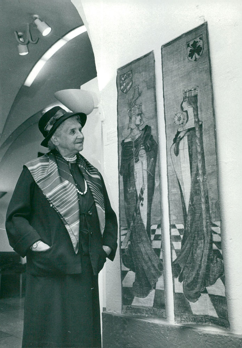 Writer Elsa BjÃ¶rkman-Goldschmidt next to two paintings by Hedvig BjÃ¶rkman at the Army Museum - Vintage Photograph
