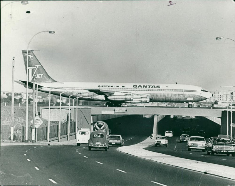 Vehicles Under the plane - Vintage Photograph