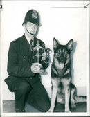 P.C Terence Smith with Arnold the police dogs. - Vintage Photograph