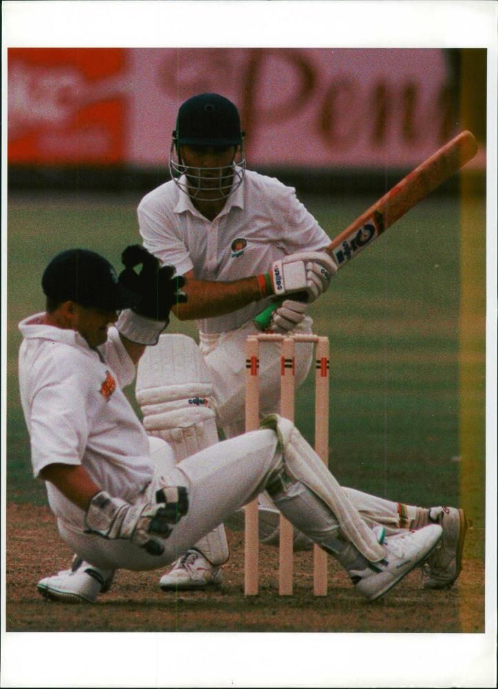 Englands steve rhodes is hit in the face by a phil tufnell delivery to rohan larkin but he was able to continue. - Vintage Photograph