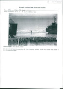 a lone veterans breaks from the crowd - Vintage Photograph