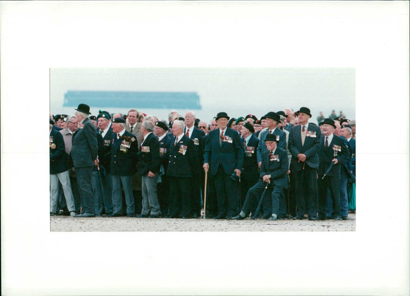 veterans on arromanches beach - Vintage Photograph