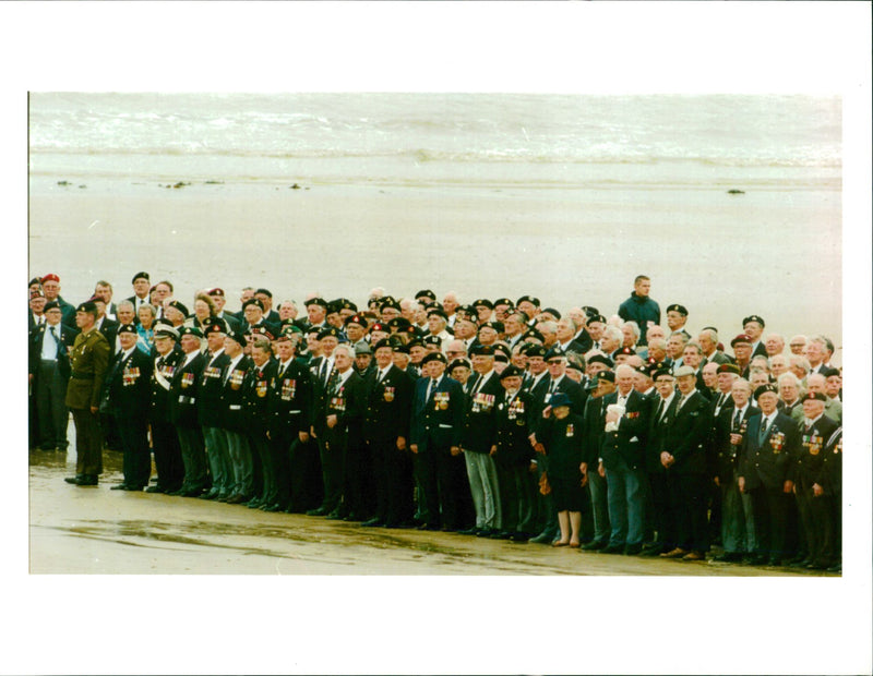 veterans on arromanches beach - Vintage Photograph