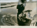 After heavy bomardment by arships and aerial attack by planes of the US navy. - Vintage Photograph