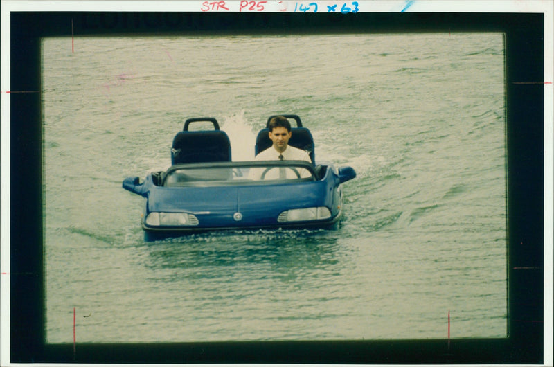 Hobby Car hasa tiller and in-board water jets - Vintage Photograph