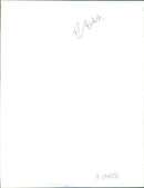 azerbaijan soldier grabs loaves of bread - Vintage Photograph