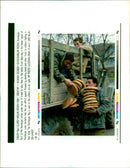 azerbaijan soldier grabs loaves of bread - Vintage Photograph